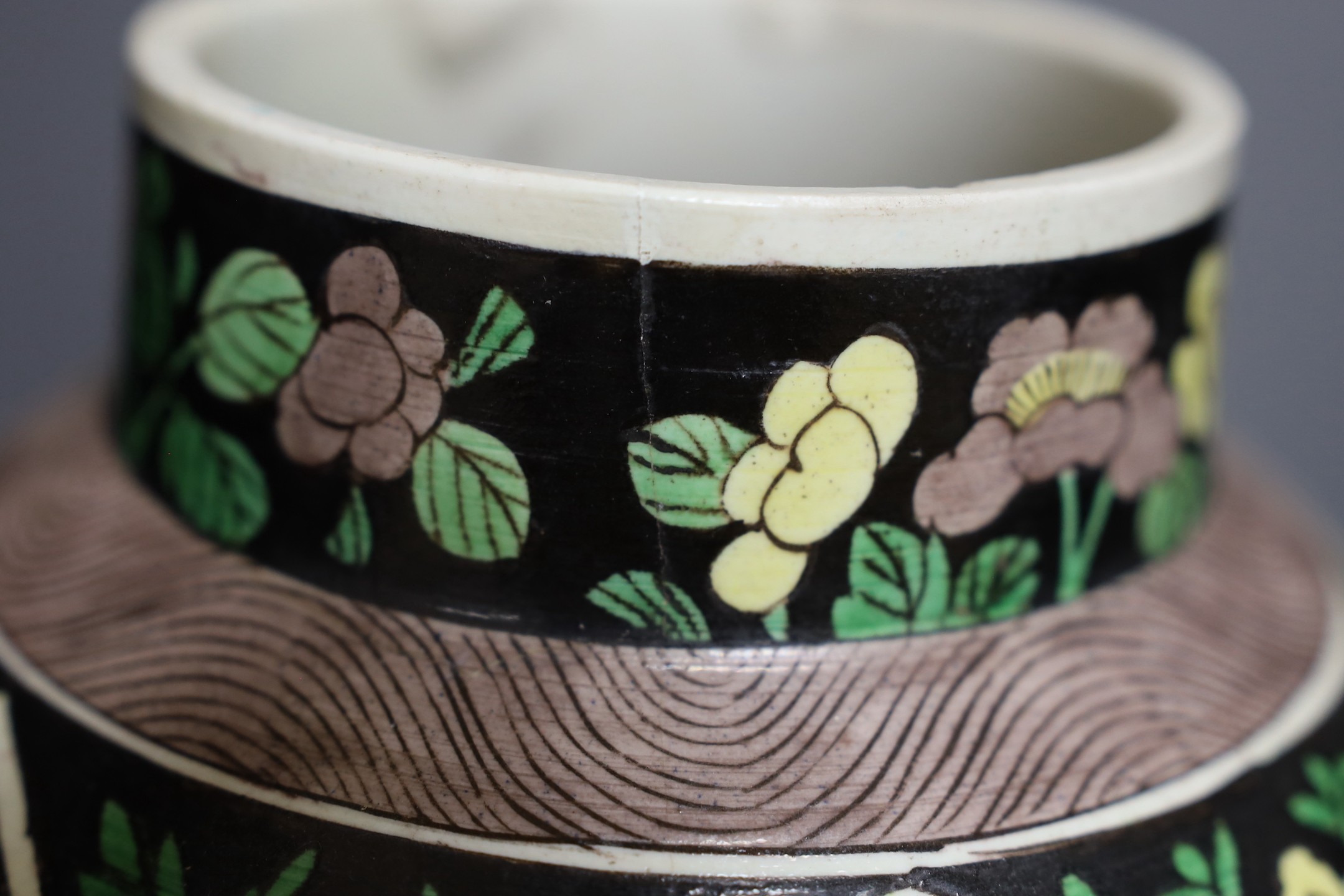A late 19th century Chinese famille noire enamelled biscuit baluster vase and cover, 49cm high